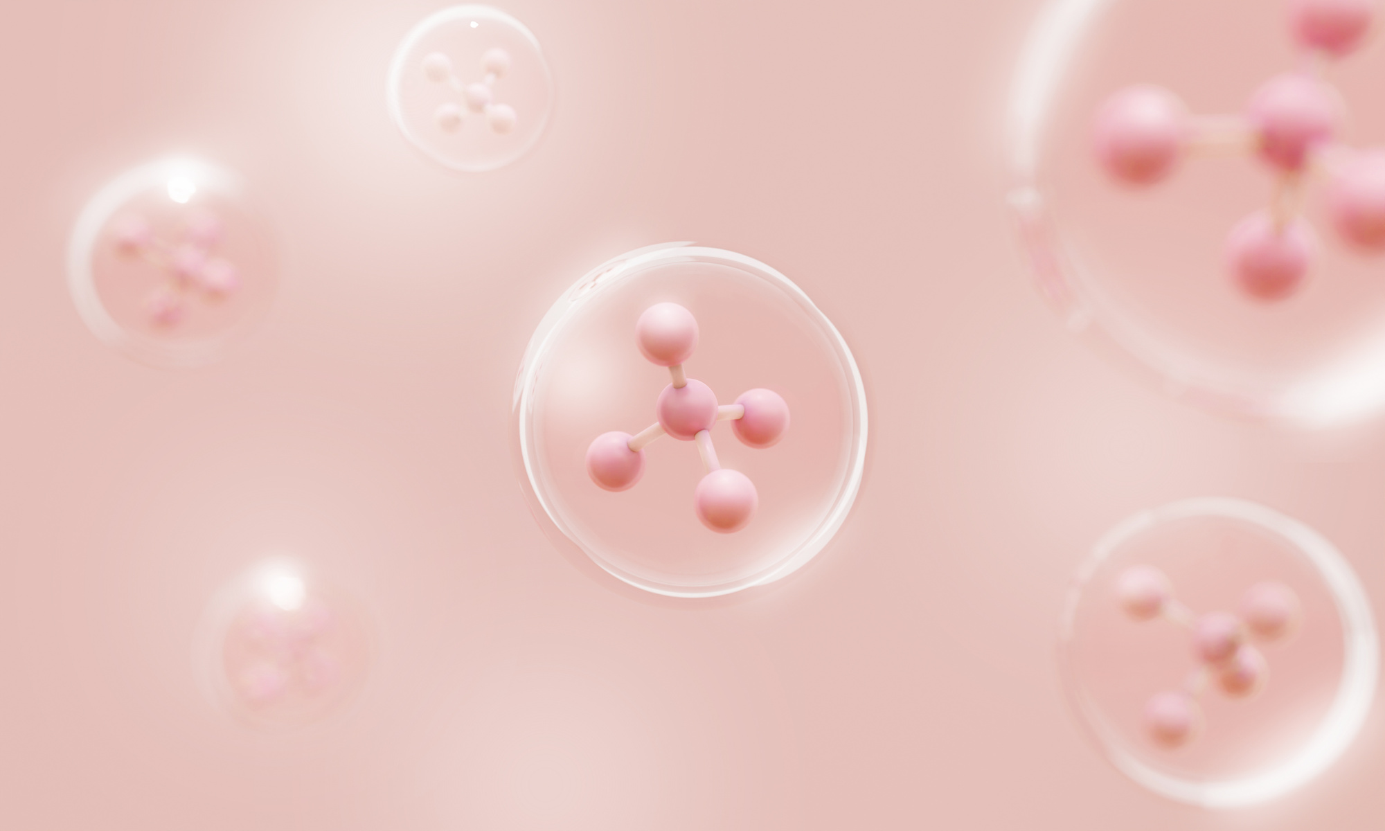 Molecule atoms inside bubbles on pink skin background. Cosmetics